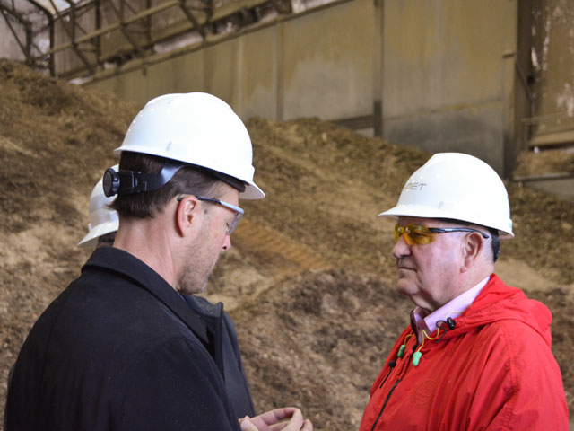 POET CEO Jeff Broin shows some elements of POET Biorefining - Chancellor in South Dakota to Agriculture Secretary Sonny Perdue (red jacket) early Thursday. Perdue held a roundtable at the ethanol plant that largely focused on E15. (DTN photo by Chris Clayton)
